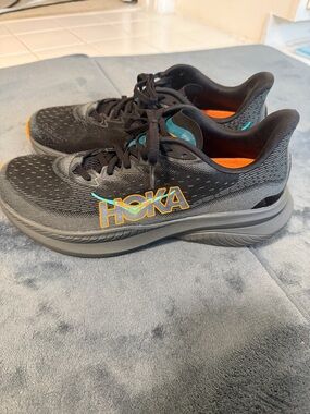 Hoka Mach 6 Black Running Sneakers with Orange and Teal Accents